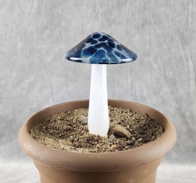 #04122403 GLOW IN THE DARK mushroom on glass stake 6''H x 4''W $80