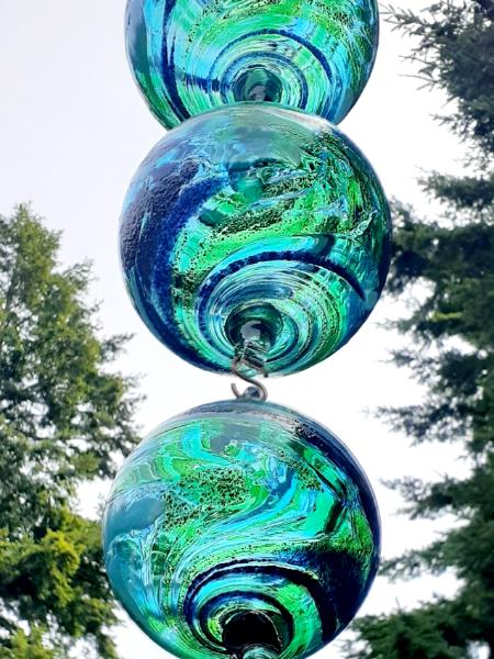#07042509 Four Hanging Ball Sculpture Lg-6.75'' Med-6'' Sm-4.75'' Xsm-3.5'' 32'' Long $250.00