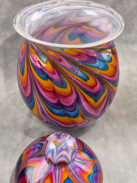 #07022607  Jar with lid Rainbow TieDie 9.25''HX5.5''W $300.00