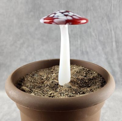 #04152409 mushroom with glass stake 6''Hx4''W $70