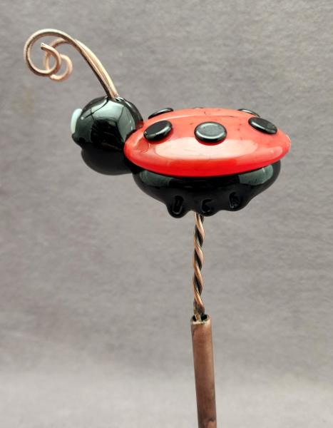 #03262406 ladybug on rod 8''Hx3''WX4''L $135